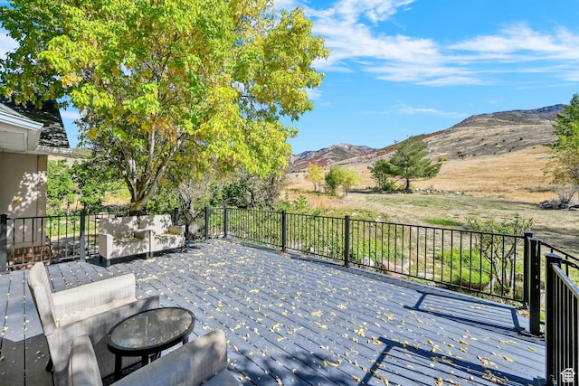 4216 N Wolf Creek Dr, Eden, UT 84310 - view of patio / terrace featuring a deck with mountain view