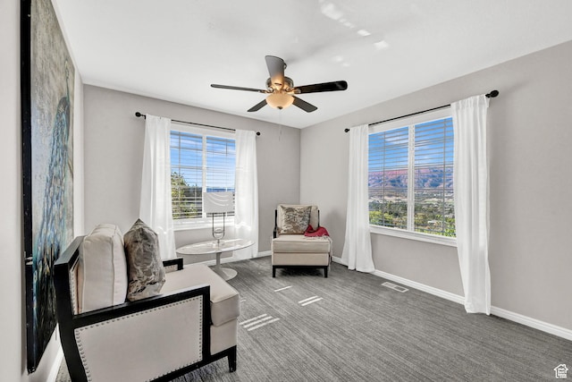 4216 N Wolf Creek Dr, Eden, UT 84310 - sitting room featuring baseboards, ceiling fan, visible vents, and a healthy amount of sunlight
