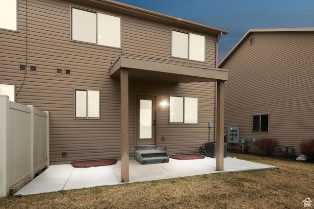 rear view of house featuring a patio area and entry steps