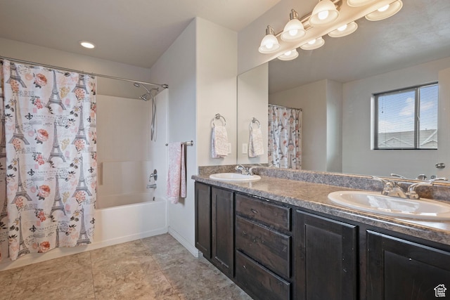 bathroom featuring double vanity and shower / bath combo
