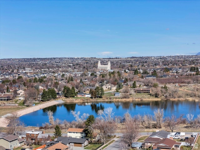 aerial view with a water view and a residential view