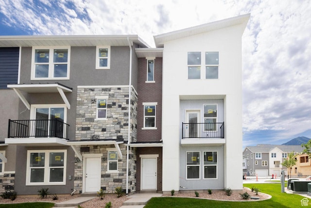 2748 E 1060 S, Spanish Fork, UT 84660 - multi unit property featuring stone siding, central AC unit, and stucco siding