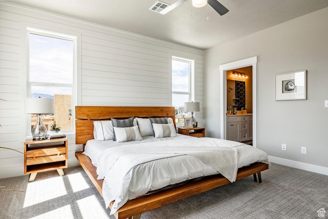 2748 E 1060 S, Spanish Fork, UT 84660 - carpeted bedroom featuring baseboards, ensuite bath, ceiling fan, and visible vents