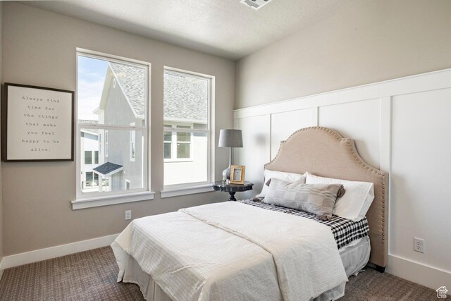 2748 E 1060 S, Spanish Fork, UT 84660 - bedroom featuring baseboards, carpet floors, a textured ceiling, and visible vents