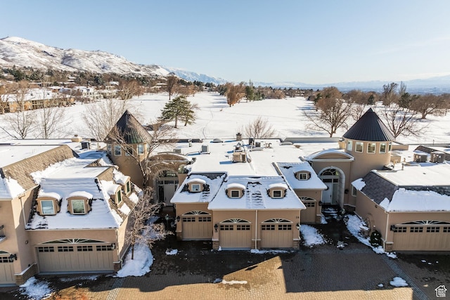 2726 E Wasatch Dr Unit 18, Salt Lake City, UT 84108 - snowy aerial view featuring a mountain view