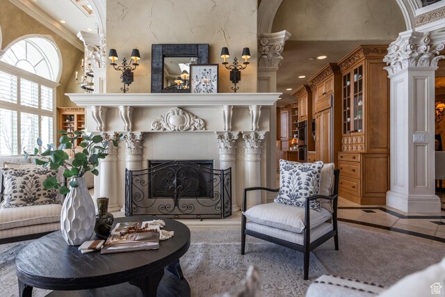 2726 E Wasatch Dr Unit 18, Salt Lake City, UT 84108 - living room featuring a high end fireplace, recessed lighting, crown molding, and ornate columns