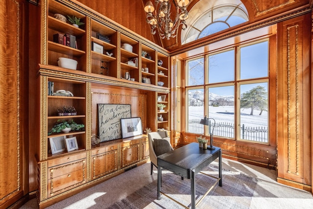 2726 E Wasatch Dr Unit 18, Salt Lake City, UT 84108 - home office featuring lofted ceiling, dark colored carpet, built in features, and an inviting chandelier