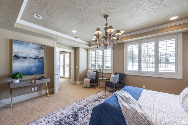 2726 E Wasatch Dr Unit 18, Salt Lake City, UT 84108 - carpeted bedroom with a textured ceiling, baseboards, ornamental molding, a tray ceiling, and an inviting chandelier