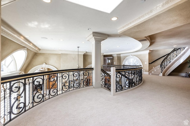 2726 E Wasatch Dr Unit 18, Salt Lake City, UT 84108 - hallway featuring carpet flooring, ornamental molding, recessed lighting, and decorative columns