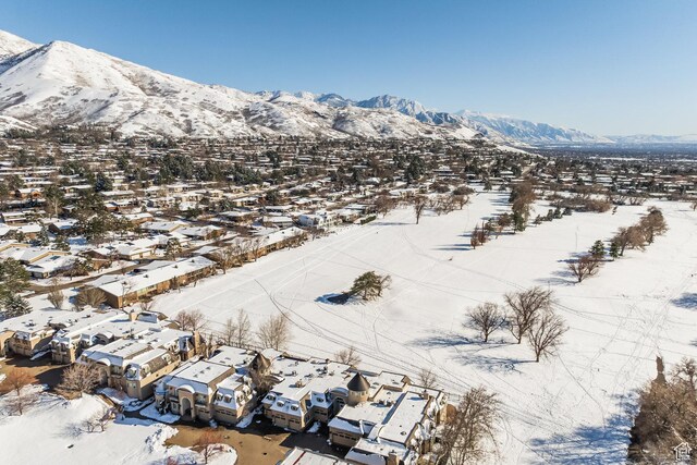 2726 E Wasatch Dr Unit 18, Salt Lake City, UT 84108 - snowy aerial view featuring a residential view and a mountain view