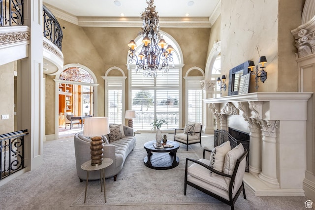 2726 E Wasatch Dr Unit 18, Salt Lake City, UT 84108 - carpeted living area featuring a fireplace, a high ceiling, ornamental molding, and a chandelier