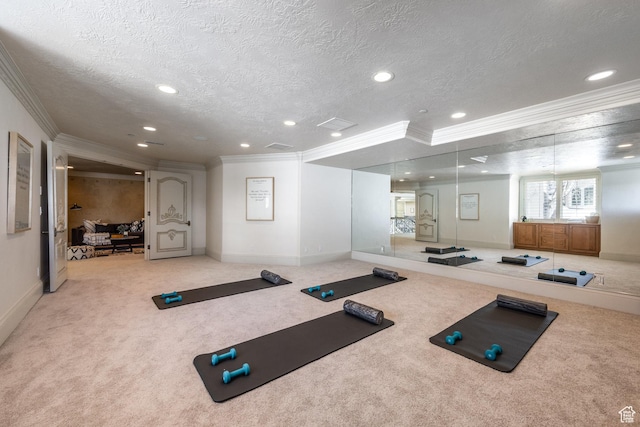 2726 E Wasatch Dr Unit 18, Salt Lake City, UT 84108 - exercise room featuring a textured ceiling, ornamental molding, and light colored carpet