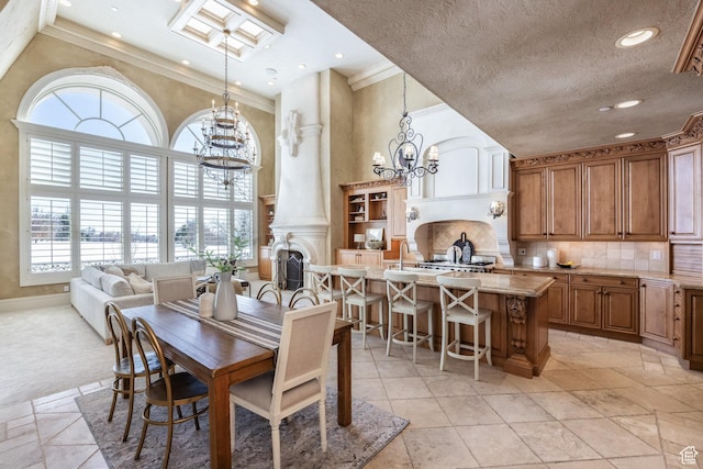 2726 E Wasatch Dr Unit 18, Salt Lake City, UT 84108 - dining area featuring a textured ceiling, crown molding, a towering ceiling, and an inviting chandelier