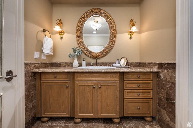 2726 E Wasatch Dr Unit 18, Salt Lake City, UT 84108 - bathroom with tile walls, wainscoting, and vanity