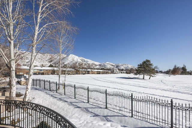 2726 E Wasatch Dr Unit 18, Salt Lake City, UT 84108 - snowy yard featuring fence and a mountain view