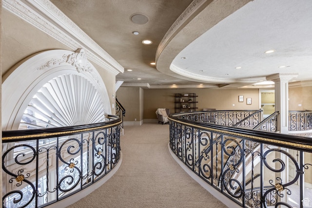 2726 E Wasatch Dr Unit 18, Salt Lake City, UT 84108 - corridor with an upstairs landing, carpet floors, baseboards, ornamental molding, and ornate columns