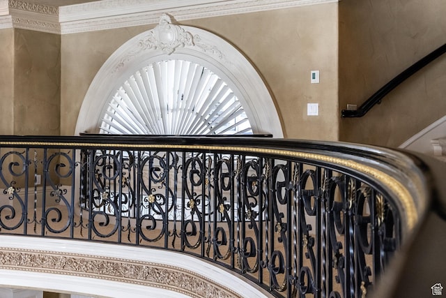 2726 E Wasatch Dr Unit 18, Salt Lake City, UT 84108 - staircase featuring crown molding
