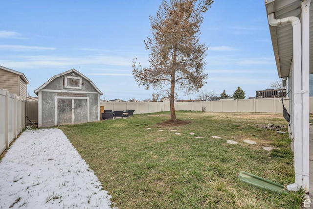 4933 S 3900 W, Roy, UT 84067 - view of yard featuring a fenced backyard, an outdoor structure, and a shed