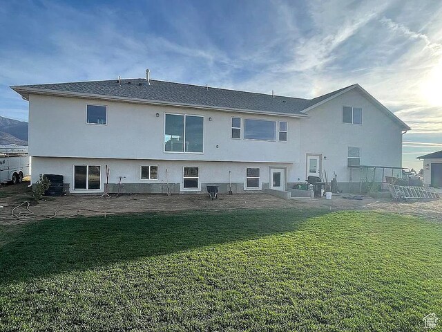 555 E 500 S, Fillmore, UT 84631 - rear view of house with a lawn and a patio