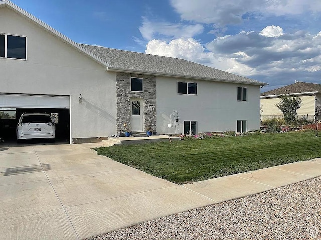 555 E 500 S, Fillmore, UT 84631 - view of front facade featuring concrete driveway, stucco siding, stone siding, a front lawn, and a shingled roof