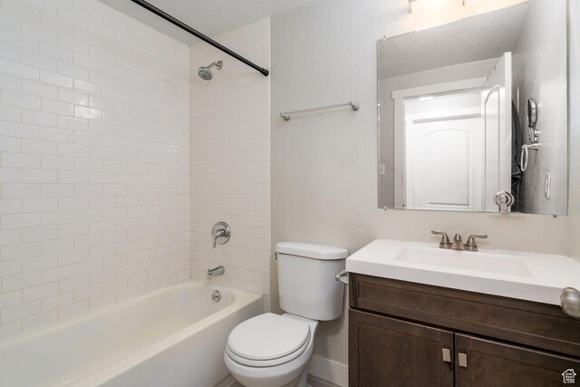 1305 N Valentine St, Salt Lake City, UT 84116 - full bath with a textured ceiling, baseboards, toilet, vanity, and bathing tub / shower combination