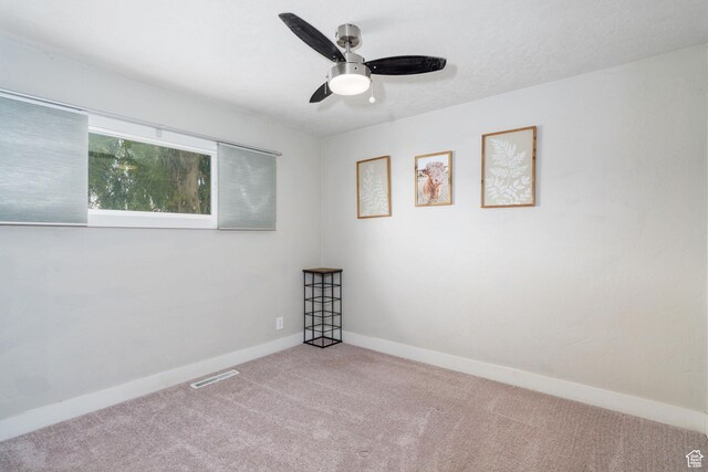 1305 N Valentine St, Salt Lake City, UT 84116 - carpeted spare room with baseboards, a textured ceiling, visible vents, and a ceiling fan