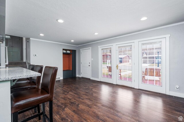 1305 N Valentine St, Salt Lake City, UT 84116 - dining area with baseboards, crown molding, recessed lighting, and dark wood-style flooring