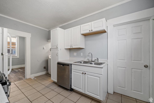 169 E 30th St S, Ogden, UT 84401 - kitchen featuring white cabinetry, light countertops, stainless steel dishwasher, a sink, and light tile patterned flooring