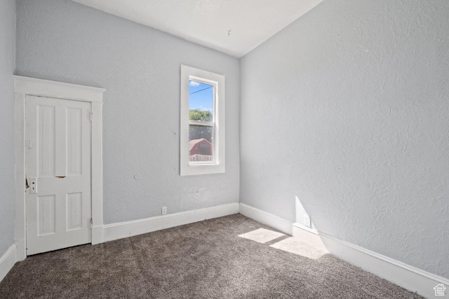 169 E 30th St S, Ogden, UT 84401 - carpeted spare room with baseboards and a textured wall