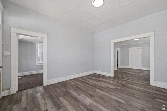 169 E 30th St S, Ogden, UT 84401 - empty room with a textured ceiling, baseboards, and wood finished floors