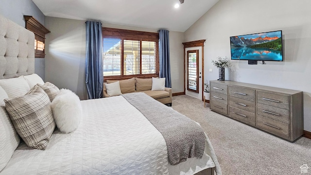 bedroom with light colored carpet, access to outside, baseboards, and vaulted ceiling