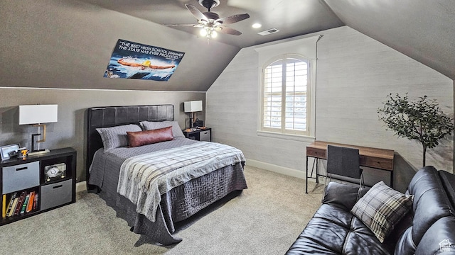 bedroom with lofted ceiling, carpet, baseboards, ceiling fan, and visible vents