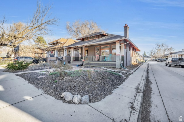 736 E 800 S, Salt Lake City, UT 84102 - bungalow featuring a chimney and a porch