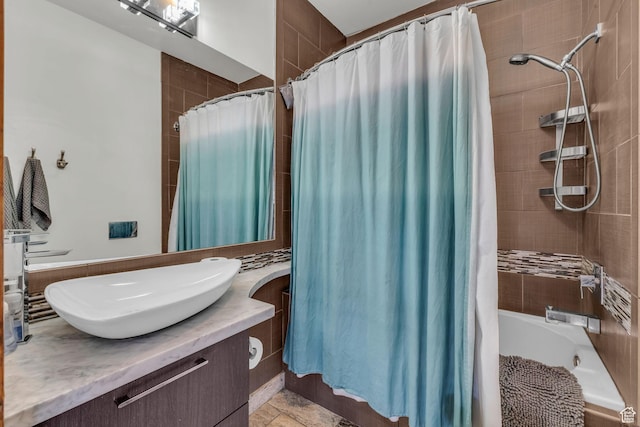 736 E 800 S, Salt Lake City, UT 84102 - full bath featuring tiled shower / bath combo and vanity
