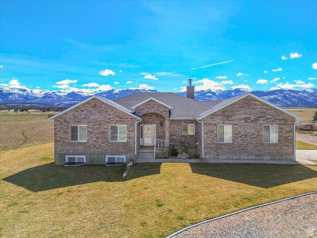 14480 N 8375 E, Spring City, UT 84662 - ranch-style house with a front lawn, brick siding, a chimney, and a mountain view