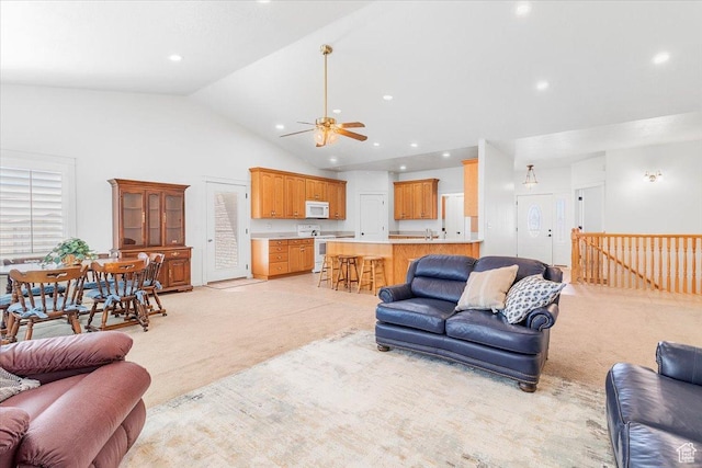 14480 N 8375 E, Spring City, UT 84662 - living room featuring ceiling fan, high vaulted ceiling, recessed lighting, and light carpet