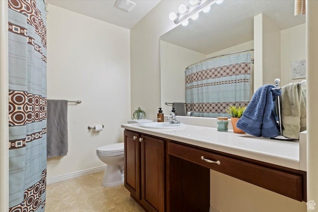 518 W 300 S Unit C, Springville, UT 84663 - bathroom featuring tile patterned floors, toilet, baseboards, and vanity