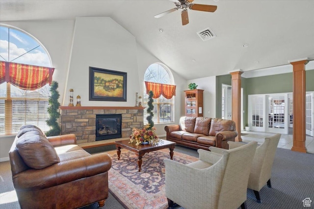518 W 300 S Unit C, Springville, UT 84663 - carpeted living room featuring decorative columns, high vaulted ceiling, visible vents, a ceiling fan, and a fireplace