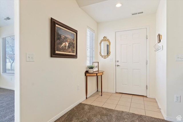 518 W 300 S Unit C, Springville, UT 84663 - foyer entrance featuring light tile patterned flooring, baseboards, visible vents, and light carpet