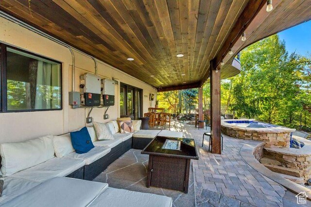 1448 E 155 S, Lindon, UT 84042 - view of patio / terrace featuring an outdoor hangout area, outdoor dining area, and an in ground hot tub