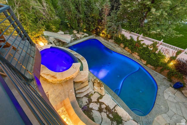 1448 E 155 S, Lindon, UT 84042 - view of swimming pool featuring a fenced backyard and a pool with connected hot tub