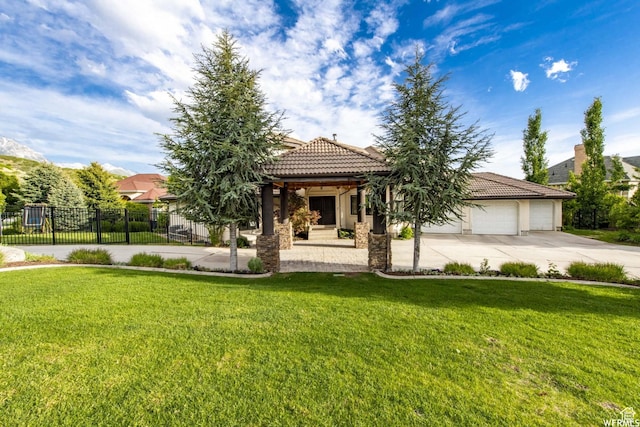 1448 E 155 S, Lindon, UT 84042 - view of front of property with a front yard, driveway, fence, and an attached garage