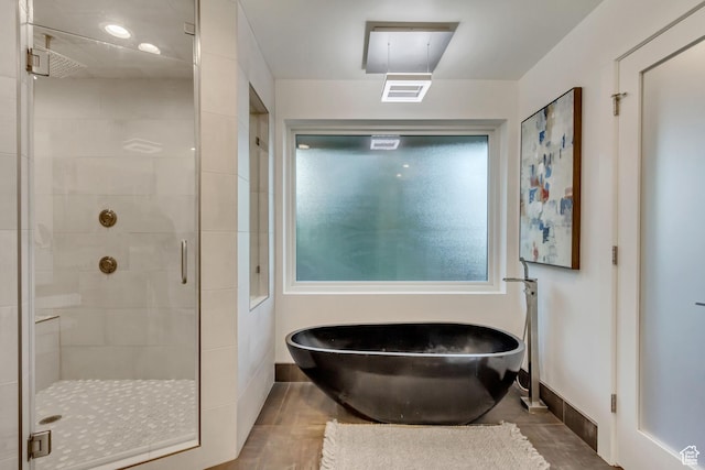 1448 E 155 S, Lindon, UT 84042 - full bathroom featuring baseboards, visible vents, a stall shower, and a soaking tub
