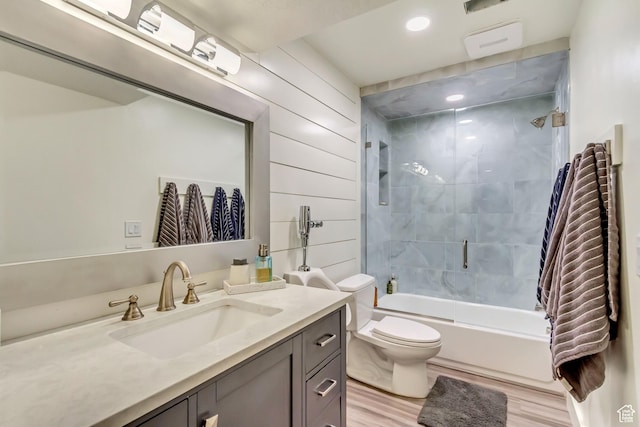 1448 E 155 S, Lindon, UT 84042 - full bathroom featuring toilet, vanity, shower / tub combination, wood finished floors, and wood walls
