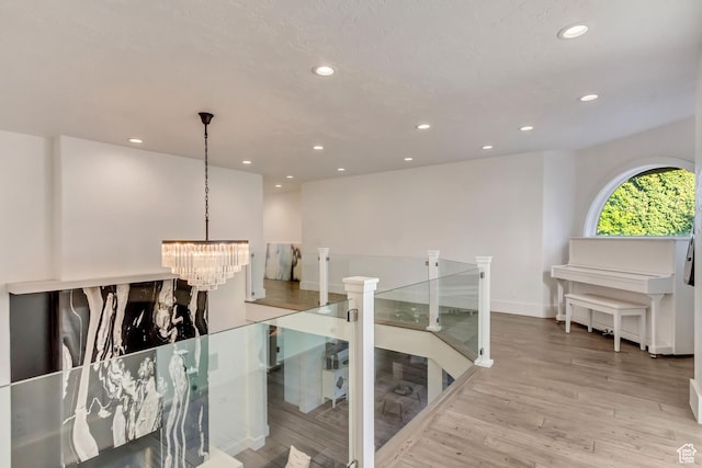 1448 E 155 S, Lindon, UT 84042 - hall with an inviting chandelier, recessed lighting, an upstairs landing, and wood finished floors