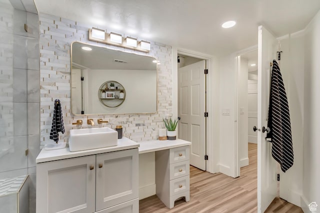 1448 E 155 S, Lindon, UT 84042 - bathroom featuring visible vents, wood finished floors, and vanity