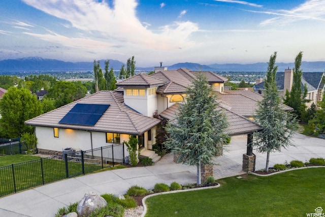 1448 E 155 S, Lindon, UT 84042 - mediterranean / spanish house with stucco siding, a tiled roof, driveway, a front yard, and fence private yard
