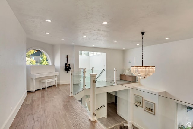 1448 E 155 S, Lindon, UT 84042 - interior space with a textured ceiling, a chandelier, baseboards, recessed lighting, and light wood-style floors