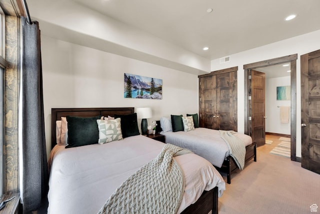 3793 Blackstone Dr Unit 2F, Park City, UT 84098 - bedroom with light carpet, ensuite bath, visible vents, and recessed lighting