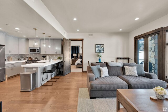 3793 Blackstone Dr Unit 2F, Park City, UT 84098 - living room featuring visible vents, recessed lighting, and light wood-type flooring